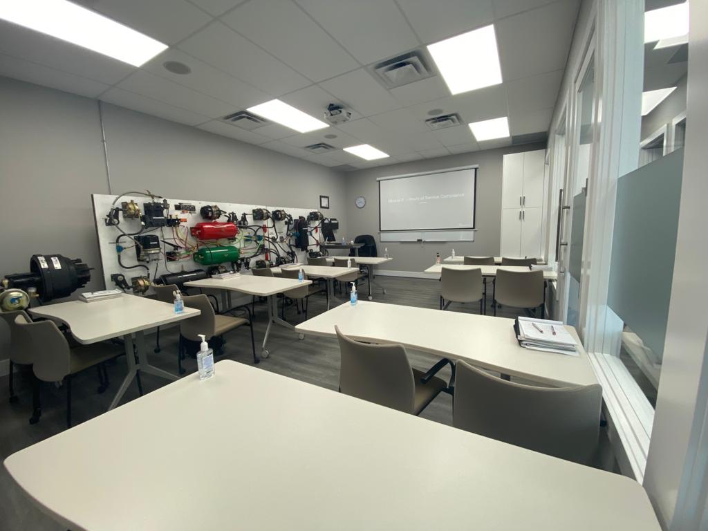 Classroom of the truck driving school in Calgary with Air Brake stands