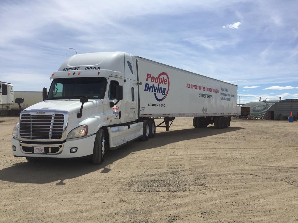 Branded Semi-Truck for Drivers training and preparation for the road test